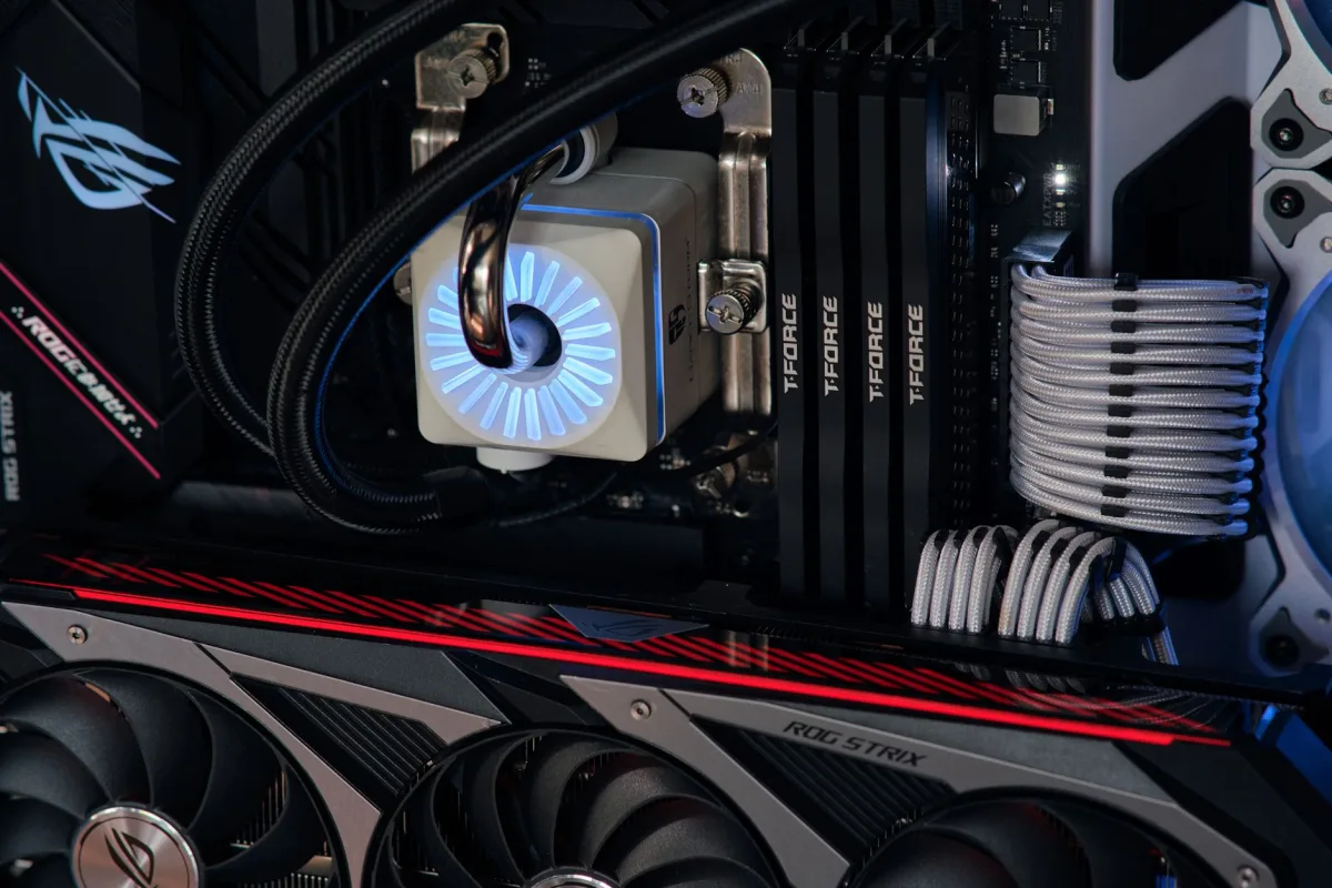 Close-up view of a high-performance gaming PC interior with cool lighting.